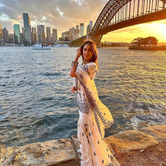 BEAUTIFUL SARA ALI KHAN WHITE SHRARA SET WITH ALL OVER SEQUENCE EMBROIDFERY WORK - Picture 9 of 12